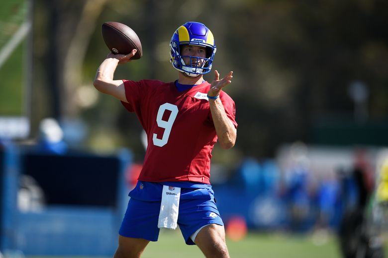 Matthew Stafford throws passes in Rams' camp practice opener