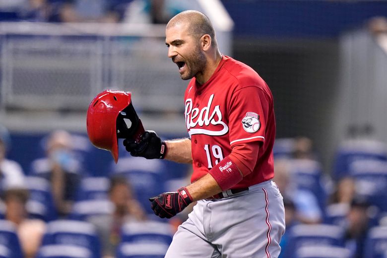 Why Joey Votto wore a high school football jersey in press conference