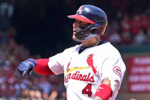 Cardinals re-sign C Yadier Molina for 18th season