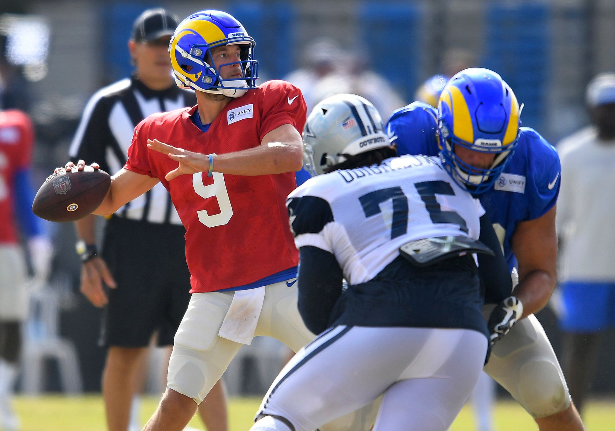 Cowboys quarterbacks don't wear red practice jerseys and even Gil