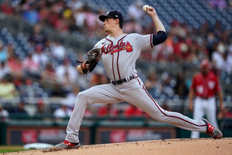 Albies, Swanson power Braves past Nationals 12-2