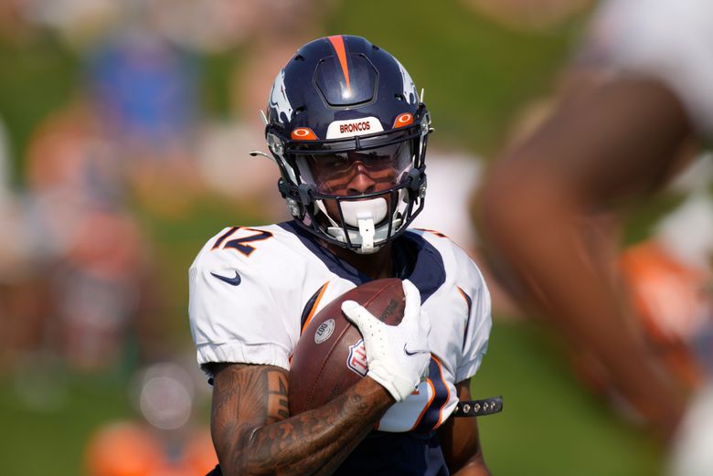 AP Source: Broncos trade receiver Trinity Benson to Lions