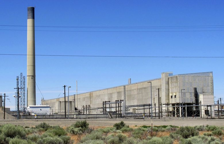 FILE – This May 13, 2017 file photo shows a portion of the Plutonium Finishing Plant on the Hanford Nuclear Reservation near Richland, Wash. The state of Washington said Tuesday, Jan. 8, 2019 that it opposes a federal proposal to reclassify as less dangerous some radioactive waste stored in underground tanks at the site. State officials said Tuesday they fear the change will allow the federal government to walk away from its obligation to clean up millions of gallons of radioactive waste. (AP Photo/Nicholas K. Geranios, File) LA212