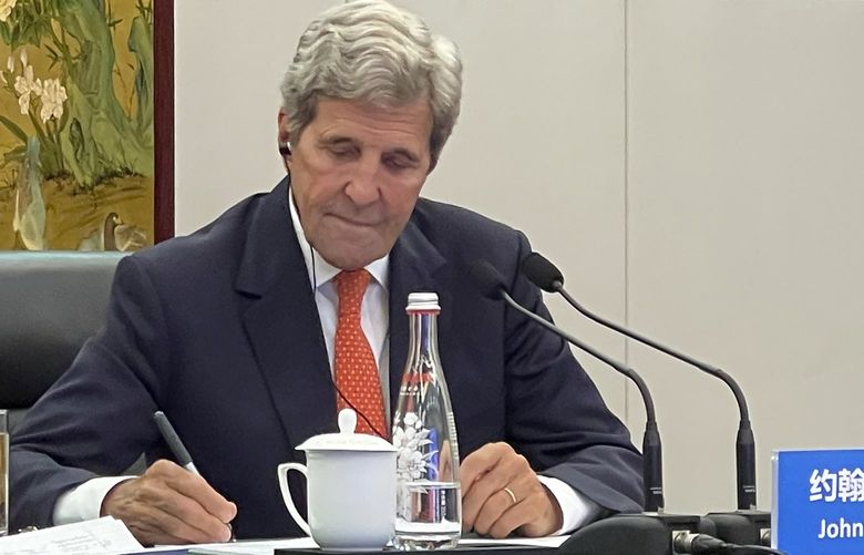 In this photo provided by the U.S. Department of State, U.S. Special Presidential Envoy for Climate John Kerry attends a meeting with Chinese Foreign Minister Wang Yi via video link in Tianjin, China, Wednesday, Sept. 1, 2021. Wang warned Kerry on Wednesday that deteriorating U.S.-China relations could undermine cooperation between the two on climate change. (U.S. Department of State via AP) XBEJ201 XBEJ201