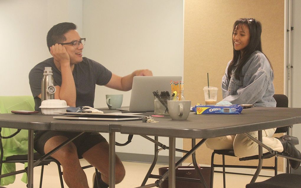 Playwright Justin Huertas and theater artist and singer Rheanna Atendido work on Huertas’ new musical, “We’ve Battled Monsters Before,” debuting at ArtsWest in November. (Crystal Paul / The Seattle Times)