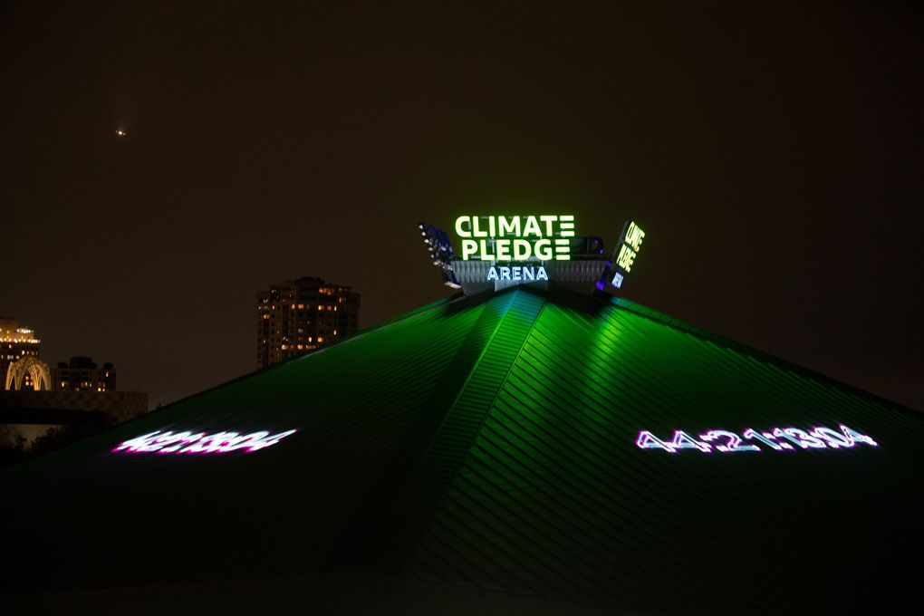 A countdown to the Coldplay concert is projected on the roof of Climate Pledge Arena Tuesday night. (Jennifer Buchanan / The Seattle Times)