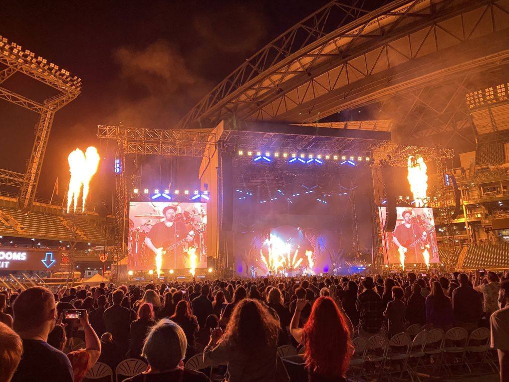 Fall Out Boy gives a fiery performance during the Hella Mega tour with Green Day and Weezer at Seattle’s T-Mobile Park Monday. (Michael Rietmulder / The Seattle Times)