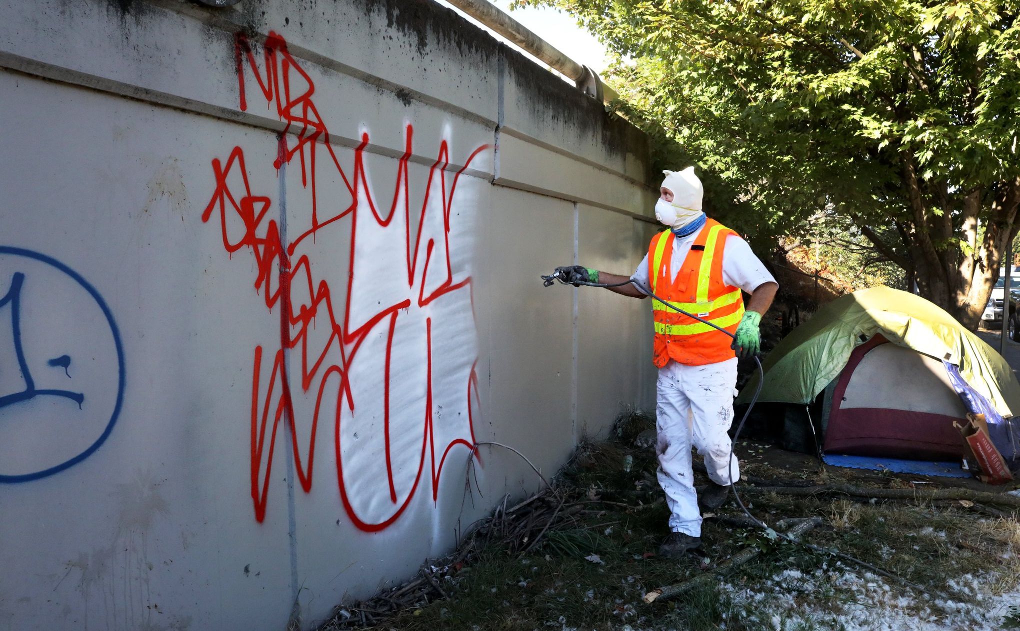 Painting over Seattle's graffiti is a game of whack-a-mole. The taggers  have won