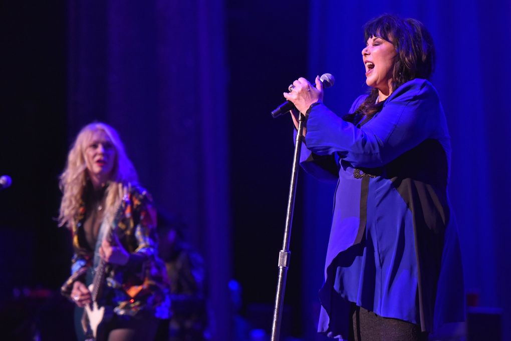 Nancy Wilson, left, is set to play with Seattle Symphony Oct. 30 at Benaroya Hall, while Ann Wilson plays the Neptune Theatre Oct. 13, 16 and 17. (Rob Grabowski / Invision / The Associated Press)