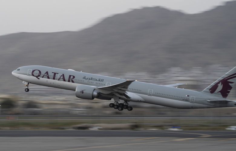 A Qatar Airways aircraft takes off with foreigners from the airport in Kabul, Afghanistan, Thursday, Sept. 9, 2021. Some 200 foreigners, including Americans, flew out of Afghanistan on an international commercial flight from Kabul airport on Thursday, the first such large-scale departure since U.S and foreign forces concluded their frantic withdrawal at the end of last month. (AP Photo/Bernat Armangue) BA102 BA102