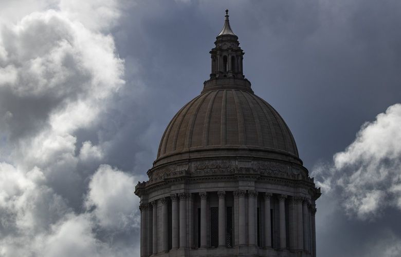 Dramatic clouds frame the dome during the final day of the legislative session at the Washington state Capitol in Olympia, Sunday April 25, 2021. 216975