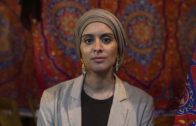 FILE – Rana Abdelhamid, a community organizer who is taking on a longtime Democratic incumbent to represent New York’s 12th District in Congress, at a restaurant in Queens, April 12, 2021. Abdelhamid and her peers who came of age after 9/11, were witnesses to how their communities were deeply affected by profiling, discrimination and surveillance of Muslims. (Benjamin Norman/The New York Times)
