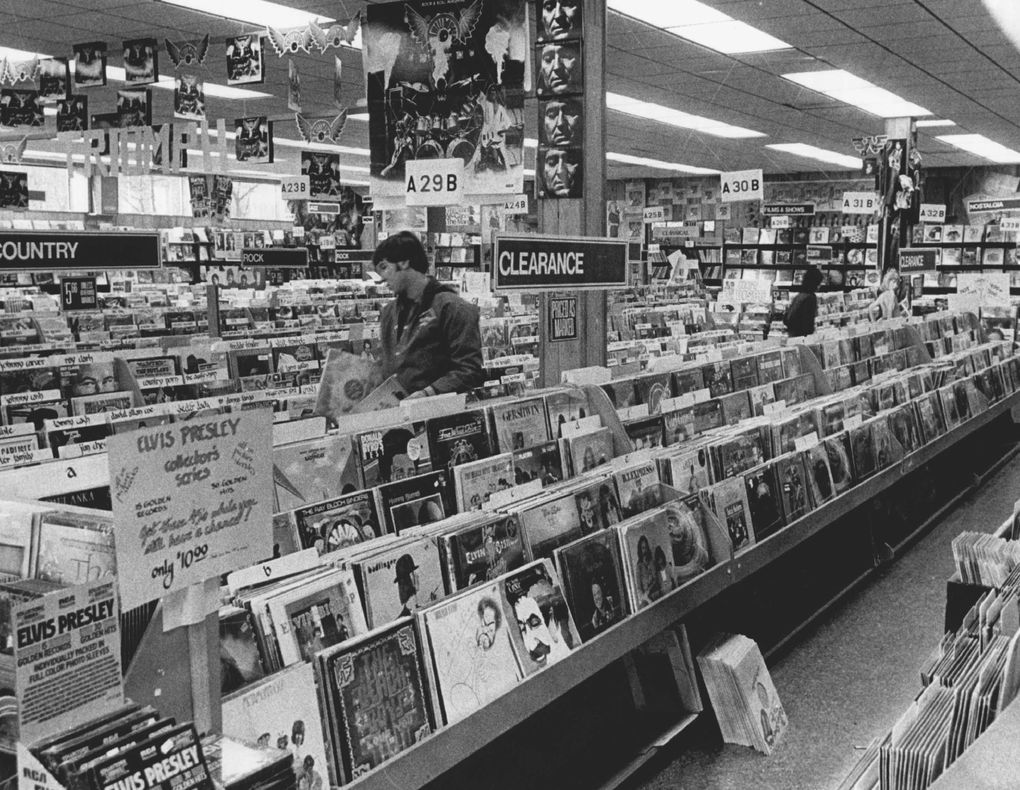 It was in the parking lot of the Tower Records store on Mercer Street, shown here in 1978, where writer Charles Cross first heard “Nevermind” in 1991. A QFC is now in that location. (Peter Liddell / The Seattle Times)