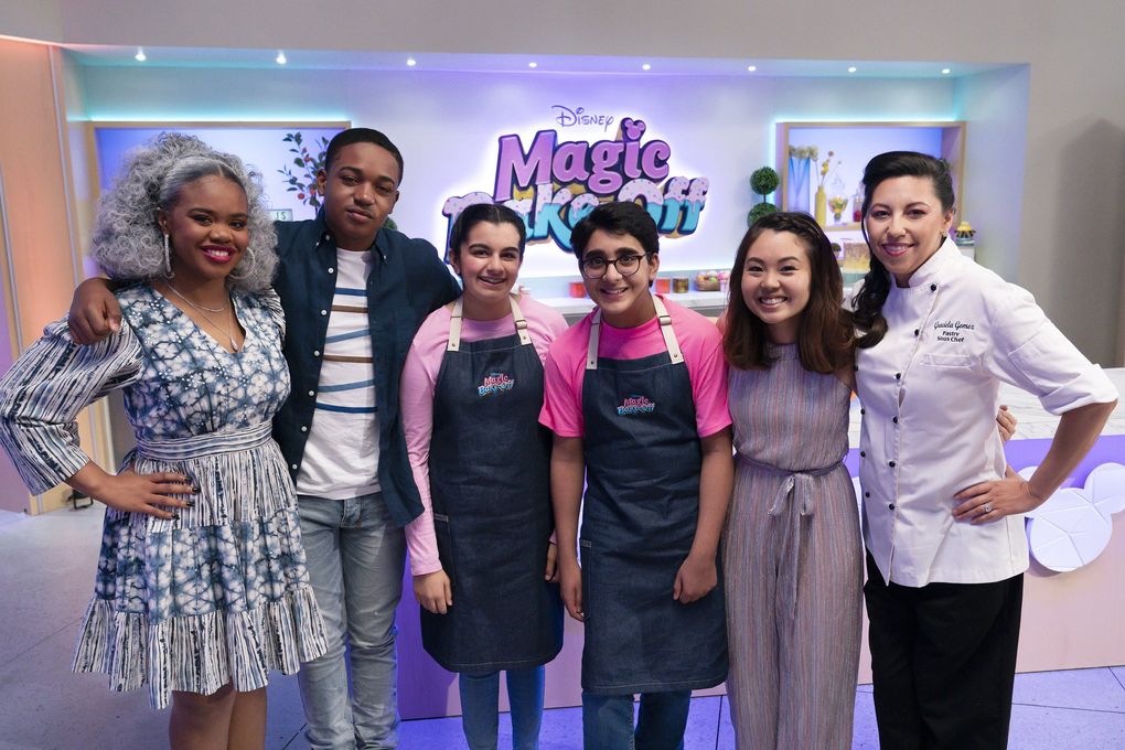 Hosts Dara Reneé and Issac Ryan Brown (left), with Bellevue friends Zahira Amarsi and Amar Deshpande, guest judge Mia Starr and pastry chef Gracie Gomez on “Disney’s Magic Bake-Off.” (Aaron Epstein / Disney)