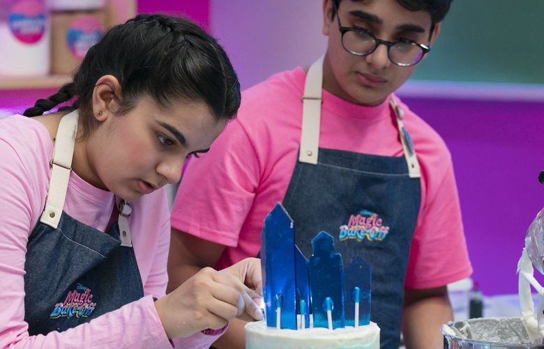 Seattle-area teens Amar Deshpande and Zahira Amarsi in “Disney’s Magic Bake-Off.”