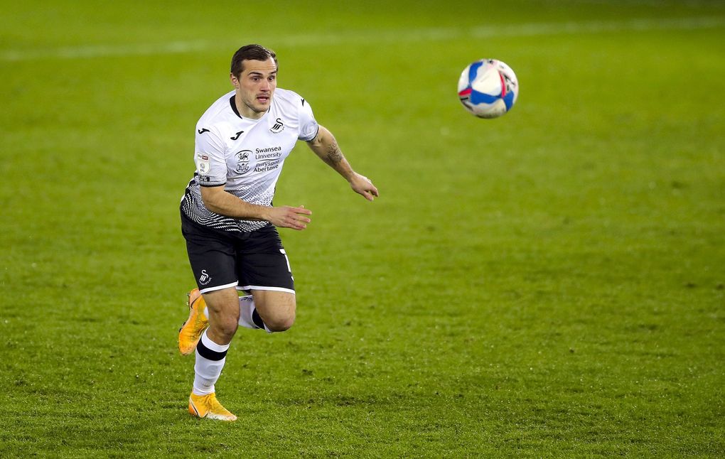 Swansea City’s Jordan Morris chases down the ball during an English Championship soccer match against Norwich City at Liberty Stadium, in Swansea, Wales, Feb. 5, 2021. (Nick Potts / PA via AP)