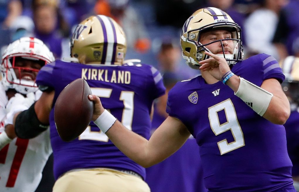 Washington Huskies finally get a win with 52-3 romp over Arkansas