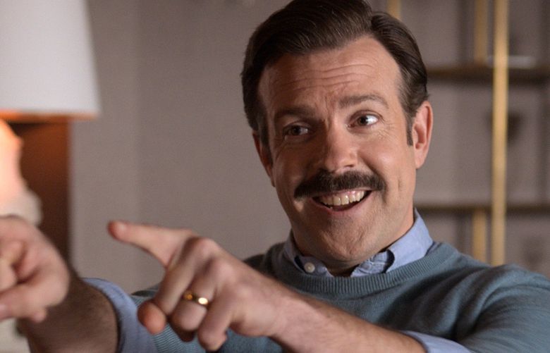 This image released by Apple TV Plus shows Jason Sudeikis in “Ted Lasso.” Sudeikis is nominated for an Emmy Award for outstanding leading actor in a comedy series. (Apple TV Plus via AP) NYET805 NYET805