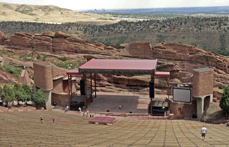 FILE – In this Aug. 13, 2008, file photo, shows an empty Red Rocks Amphitheatre outside of Denver, Colorado. Amazon says it is bringing its palm-recognition technology to the Red Rocks Amphitheatre and it will be available at other venues in the coming months. Itâ€™s the first time the technology, called Amazon One, will be used outside some of Amazonâ€™s stores, where shoppers can pay for groceries and snacks by swiping their palms. (AP Photo/Ed Andrieski, File) BKWS303 BKWS303