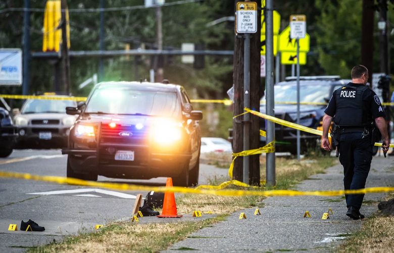 Seattle Police investigate a shooting outside Aki Kurose Middle School in Seattle Thursday August 26, 2021. – 218059