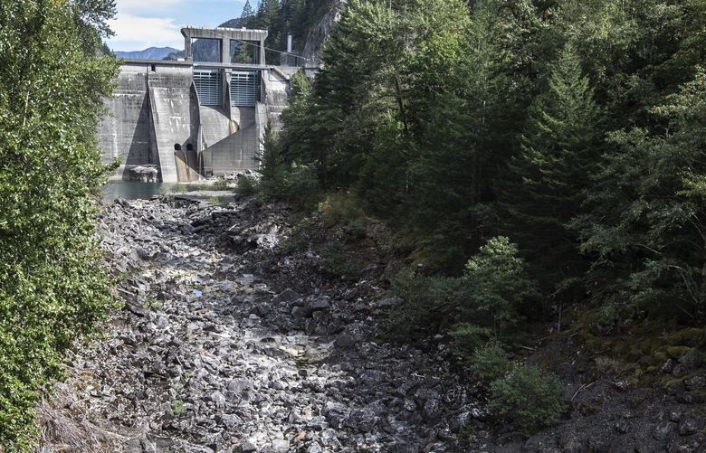 The Gorge Dam, one of three dams that Seattle City Light is facing re-licensing on the Skagit River, Sept. 9, 2021. The river is dry below the dam but water is sent to a power house downstream through a tunnel. 