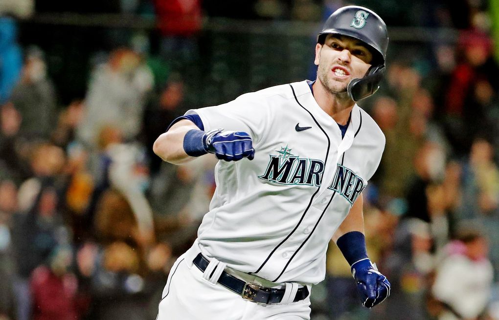 Seattle Mariners' Ty France singles in a run against the Boston Red Sox  during the fourth inning of a baseball game Tuesday, Sept. 14, 2021, in  Seattle. (AP Photo/Elaine Thompson Stock Photo 