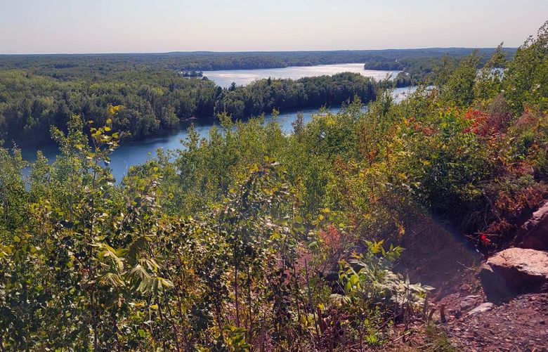A trail at the Cuyuna Lakes Mountain Bike Trails in central Minnesota leads down to a series of lakes. MUST CREDIT: The Washington Post photo by Tom Peterson