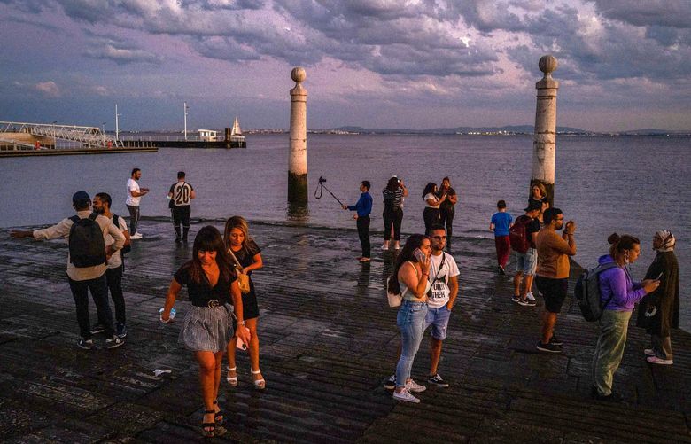 Tourists visit Cais das Colunas in Lisbon, Portugal, on September 22, 2021. MUST CREDIT: Photo by JosÃa Sarmento Matos for The Washington Post 615363c89b7d9e0cf8e76edc