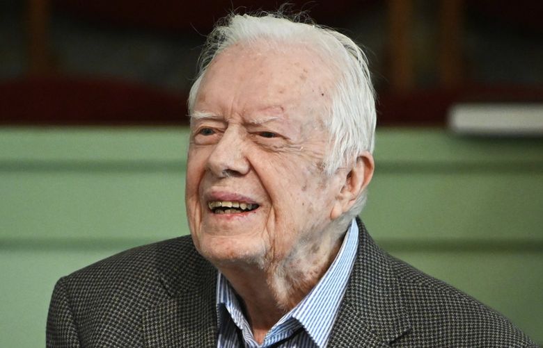 FILE – In this Nov. 3, 2019, file photo, former President Jimmy Carter teaches Sunday school at Maranatha Baptist Church in Plains, Ga. Carter is sometimes called a better former president than he was president. The backhanded compliment has always rankled Carter allies and, they say, the former president himself. Yet now, 40 years removed from the White House, the most famous resident of Plains, Georgia, is riding a new wave of attention as biographers, filmmakers, climate activists and Carterâ€™s fellow Democrats push for a recasting of his presidential legacy. (AP Photo/John Amis, File)