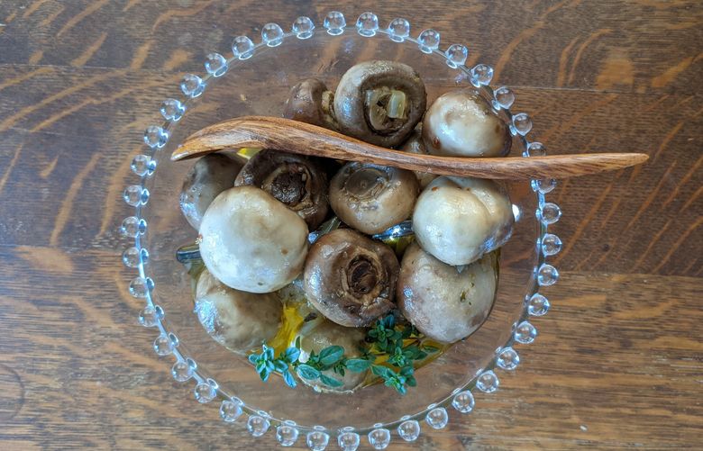 Jill Lightner was delighted to find a family recipe for a childhood favorite: pickled mushrooms. Silky and tangy, they taste just as good as she remembered. Credit: Jill Lightner