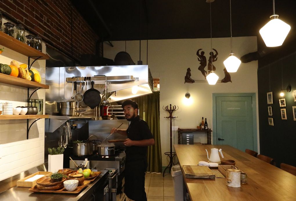Chef Aaron Verzosa, seen at work in this March 2019 file photo, is the boss at Seattle’s Archipelago, where the food is described as a contemporary expression of Filipino culture filtered through Northwest ingredients. (Ken Lambert / The Seattle Times)