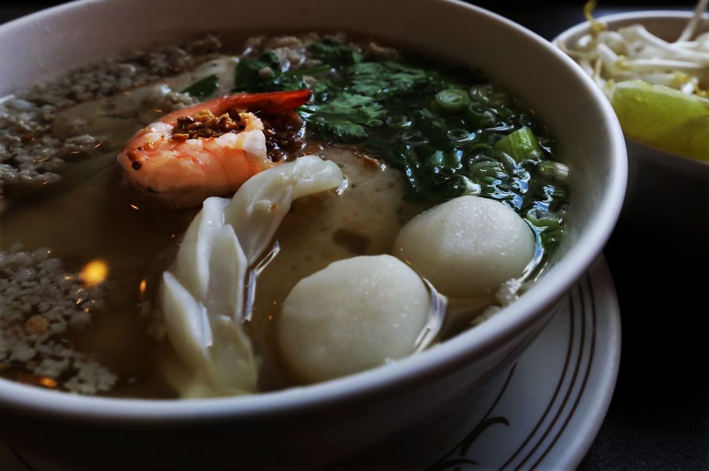 The Phnom Penh special rice noodle dish has Gulf prawns, fish cakes, fish balls, sliced and ground pork and rice noodles. (Alan Berner/The Seattle Times)