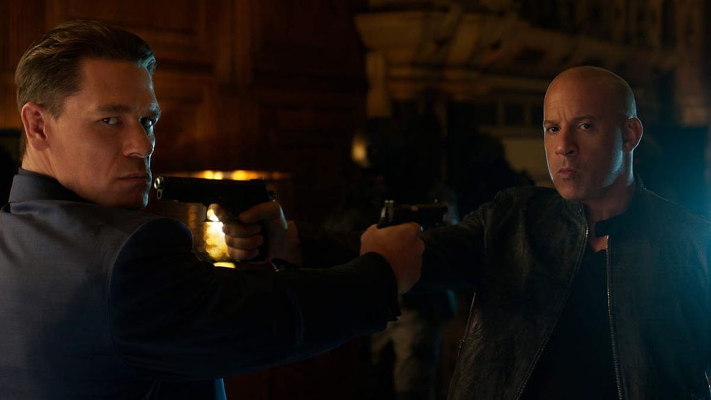 John Cena, left, and Vin Diesel in “F9: The Fast Saga.” (Universal Pictures)