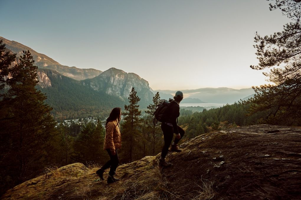 Two hikers ascend a trail just outside of Squamish in British Columbia, about four hours north of Seattle by car. (Hubert Kang / Destination BC)