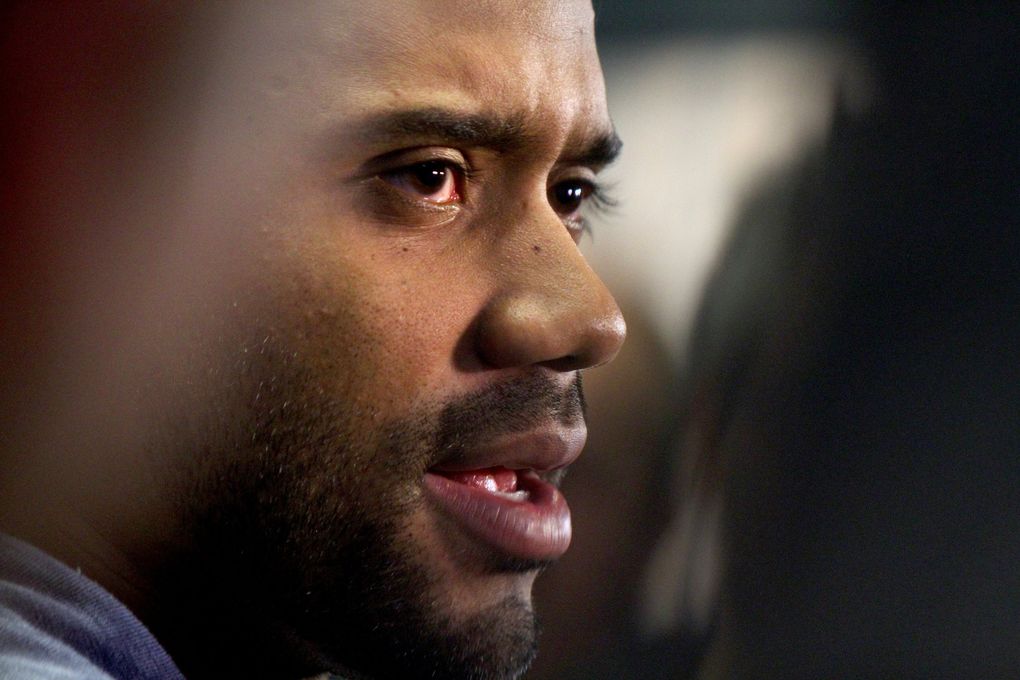 Seattle Seahawks quarterback Russell Wilson addresses the media at the Virginia Mason Athletic Center on Tuesday, Feb. 3, 2015, in Renton. (John Lok / The Seattle Times)