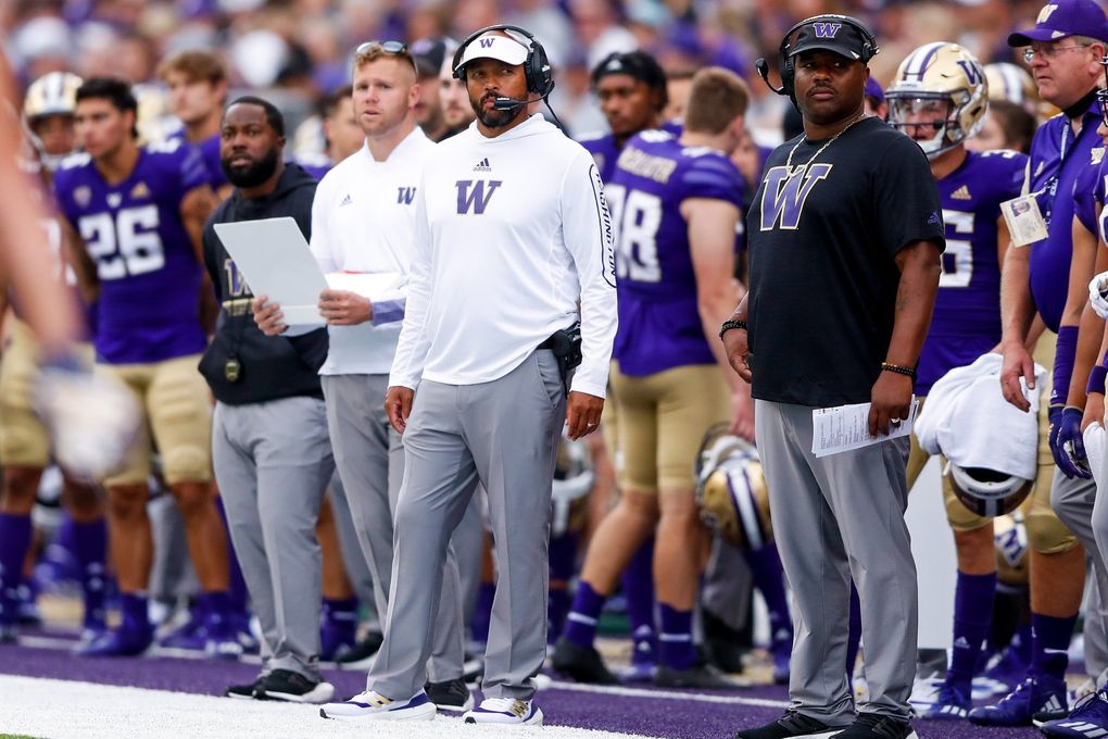 Washington Huskies head coach Jimmy Lake stands on the sidelines during the second quarter against the Montana Grizzlies Saturday, Sept. 4, in Seattle. (Jennifer Buchanan / The Seattle Times)