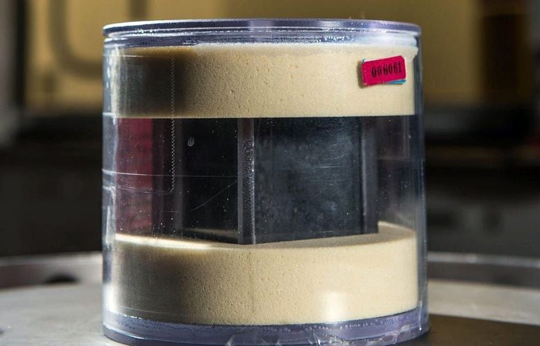 A photo provided by the Pacific Northwest National Laboratory shows the lab’s uranium cube, which is enclosed in a protective case. Scientists at the laboratory and the University of Maryland are working to determine whether three uranium cubes they have in their possession were produced by Germany’s failed nuclear program during World War II.  (Andrea Starr/Pacific Northwest National Laboratory via The New York Times)  – FOR EDITORIAL USE ONLY –