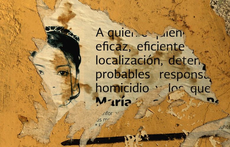A poster of a missing or murdered woman is seen in Ciudad Ju·rez.
212706