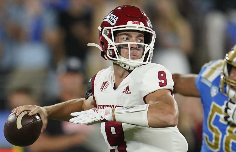 Fresno State quarterback Jake Haener looks for a receiver during the first half of the team’s NCAA college football game against UCLA on Saturday, Sept. 18, 2021, in Pasadena, Calif. (AP Photo/Marcio Jose Sanchez) CAMS101 CAMS101