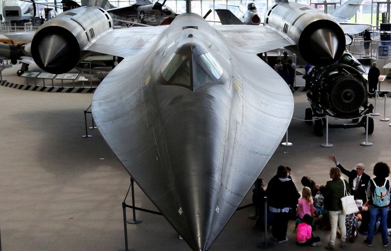 Beside a Lockheed Blackbird, the fastest and highest-flying air-breathing production plane ever built, a docent at the Museum of Flight discusses the aircraft capable of flying more than there times the speed of sound built in 1963.  Ninety-fiver per cent of the plane’s structure is titanium to withstand the heat generated by flying 2,000 miles-per-hour.


LO 
Thursday May 25, 2017