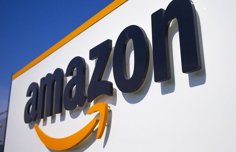 FILE – In this Thursday April 16, 2020 file photo, The Amazon logo is seen in Douai, northern France. (AP Photo/Michel Spingler, File) NY116