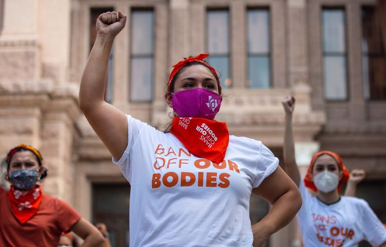 Demonstrators protest against the new state law creating an almost complete ban on abortions in Texas, outside the State Capitol in Austin, Wednesday, Sept. 1, 2021. To protest Texas’s new abortion law, activists said they flooded the website set up by the state’s largest anti-abortion group with fake tips. (Montinique Monroe/The New York Times) XNYT70 XNYT70