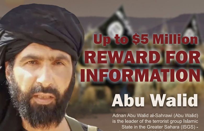 This undated image provided by Rewards For Justice shows a wanted posted of Adnan Abu Walid al-Sahrawi, the leader of Islamic State in the Greater Sahara. French President Emmanuel Macron announced the death of al-Sahrawi on Wednesday, calling the killing â€œa major successâ€ for the French military after more than eight years fighting extremists in the Sahel. Macron tweeted that al-Sahrawi â€œwas neutralized by French forcesâ€ but gave no further details.  (Rewards For Justice via AP) NYPH900 NYPH900