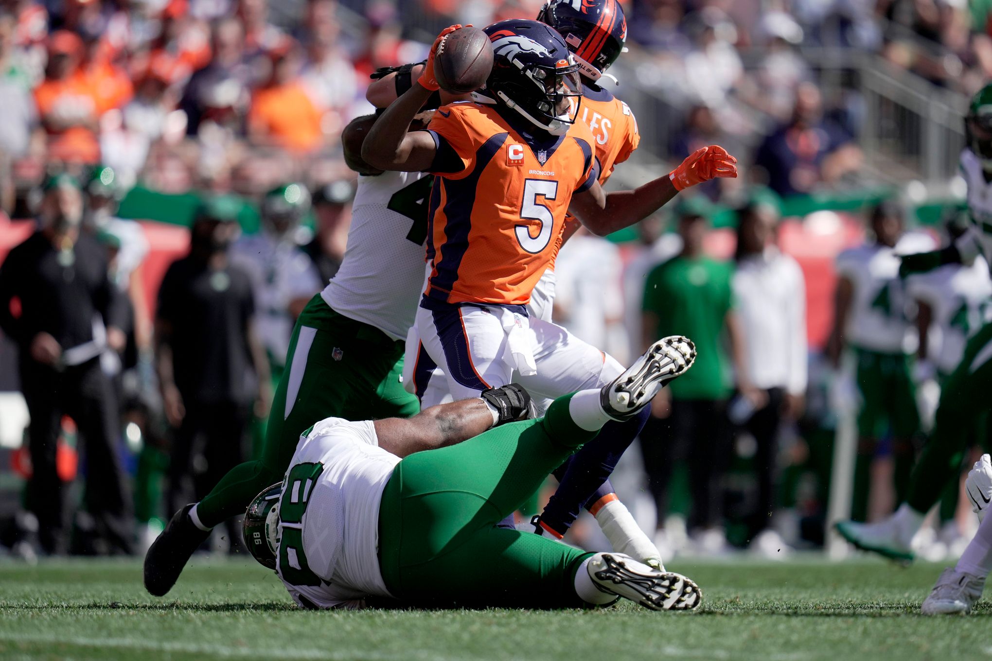 New York Jets defensive tackle Sheldon Rankins tackles Denver