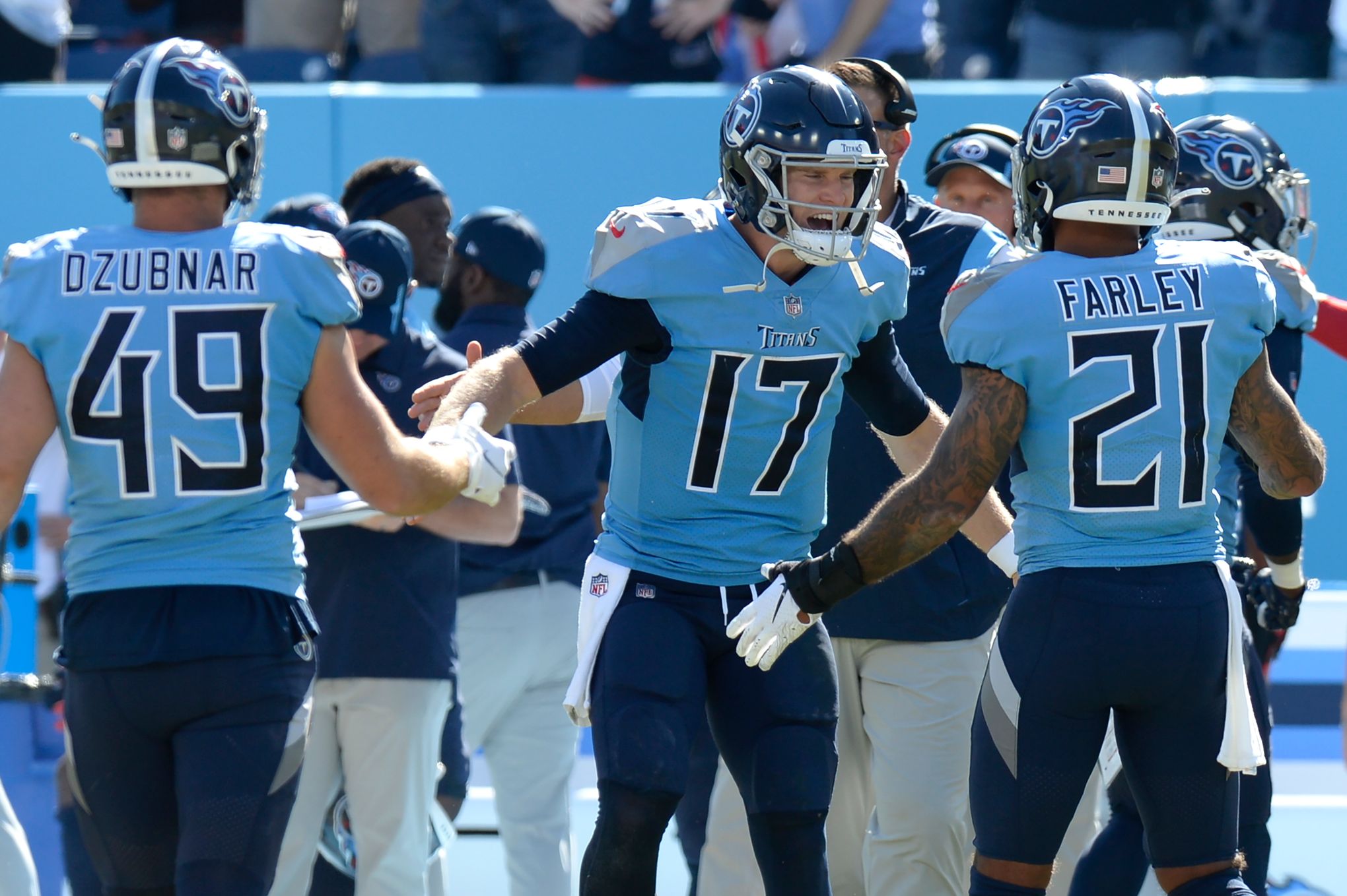 Tennessee Titans quarterback Ryan Tannehill (17) runs off the