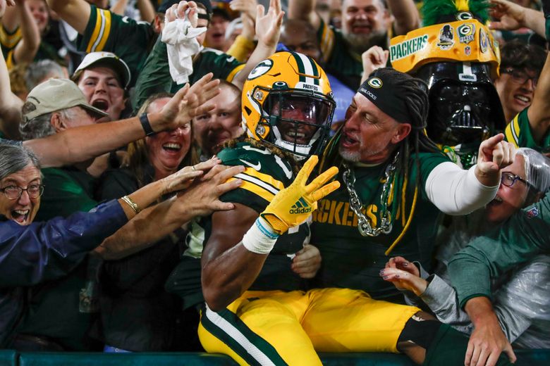 Detroit Lions cornerback Ifeatu Melifonwu lays the boom on a sideline hit  vs. Green Bay Packers running back Aaron Jones