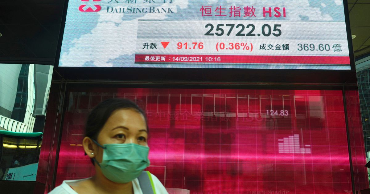 Asian stocks mixed as investors await US inflation data | The Seattle Times
