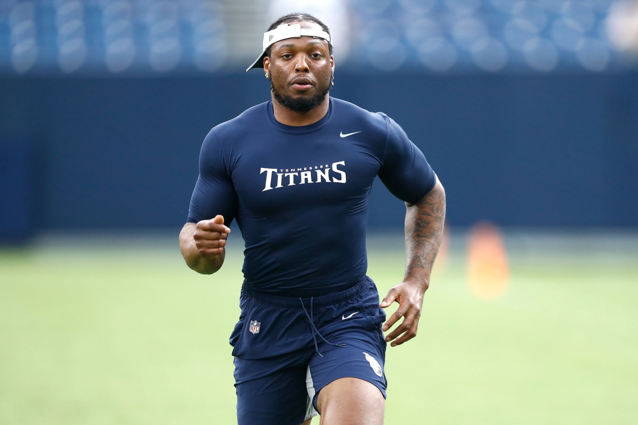 AFC running back Derrick Henry of the Tennessee Titans (22) warms