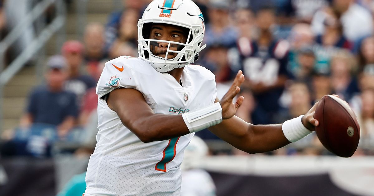 Miami Dolphins Tua putting helmet on as Jacoby Brissett goes down