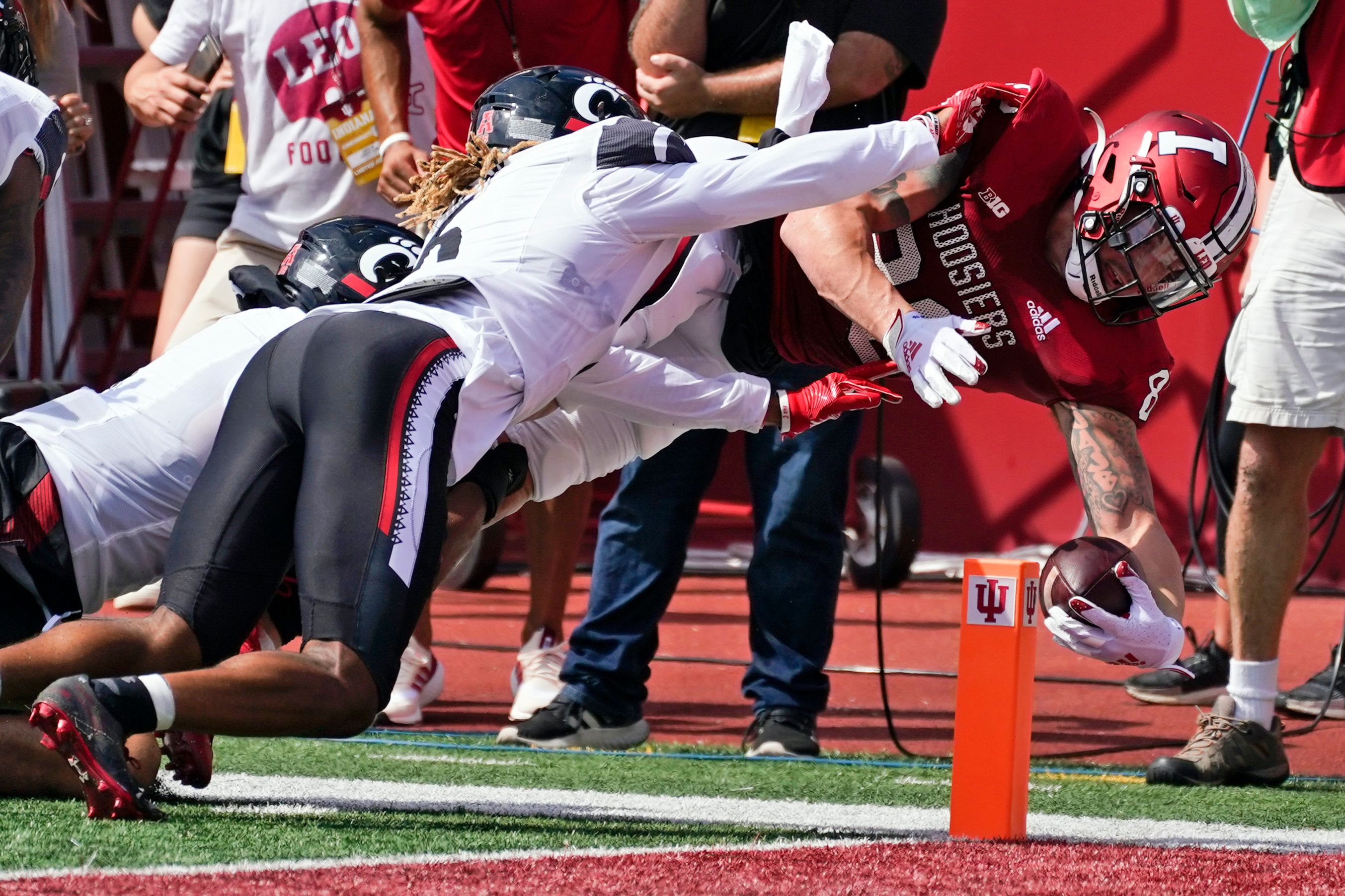 Ridder helps No. 8 Bearcats rally for 38-24 win at Indiana | The